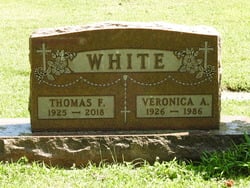 Thomas F White